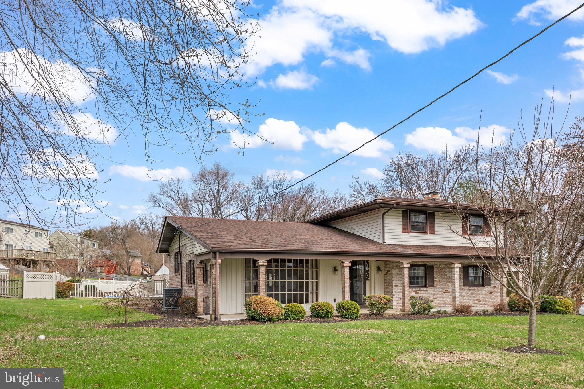 5030 Silver Spring Road Perry Hall, MD 21128 - Photo 95 of 97 a front view of a house with a yard