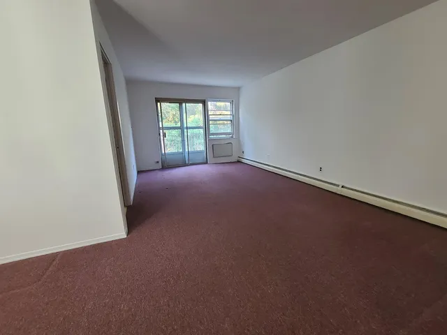 a view of a kitchen with a sink
