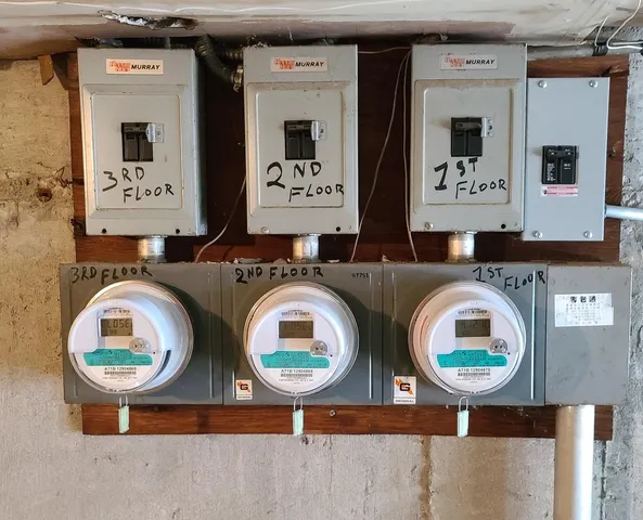 a bathroom with a toilet and mirror