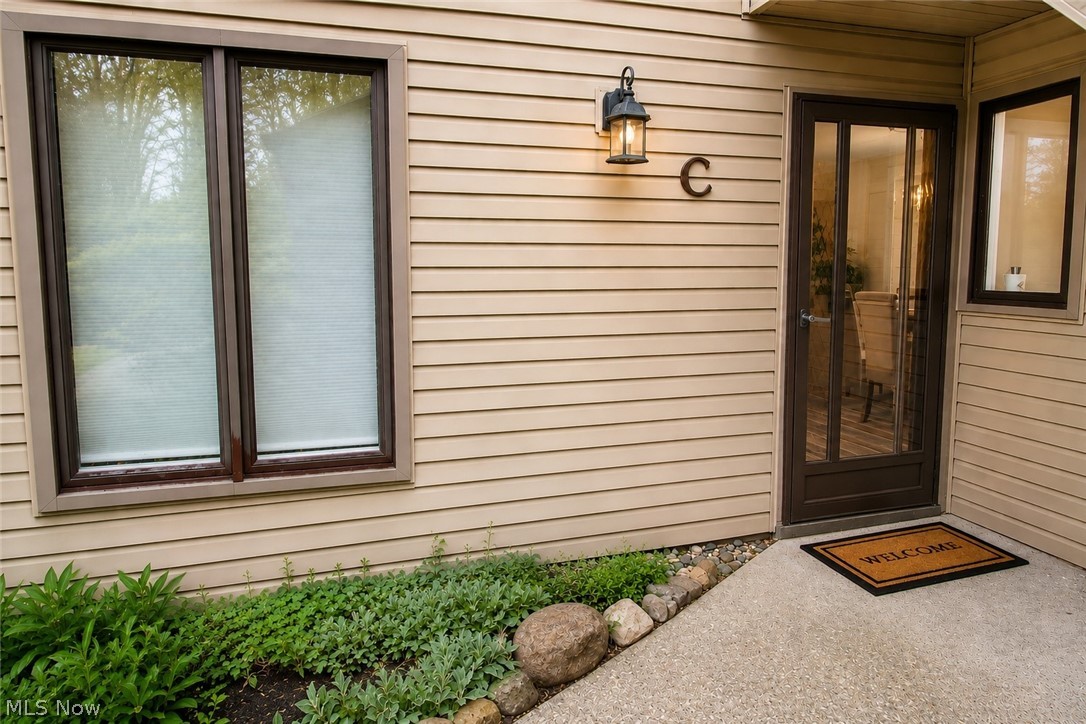 16575 Wren Road, Unit 3C Chagrin Falls, OH 44023 - Photo 2 of 29 Entrance with glass-paneled storm door