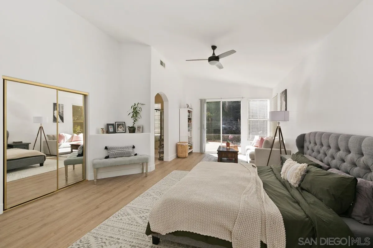 1461 Knoll Park Glen Escondido, CA 92029 - Photo 14 of 25 a bed room with a bed and a couch