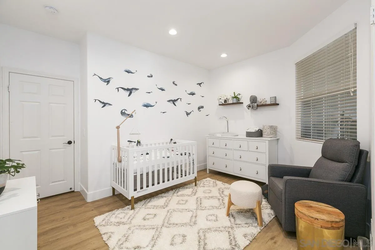 1461 Knoll Park Glen Escondido, CA 92029 - Photo 17 of 25 a bedroom with furniture and a wooden floor