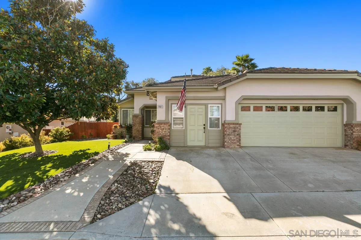 1461 Knoll Park Glen Escondido, CA 92029 - Photo 2 of 25 a view of a white house with a yard