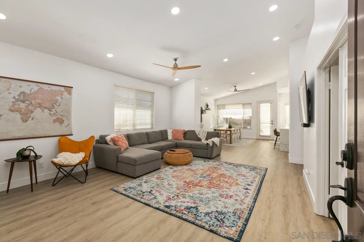 1461 Knoll Park Glen Escondido, CA 92029 - Photo 4 of 25 a living room with furniture and a rug