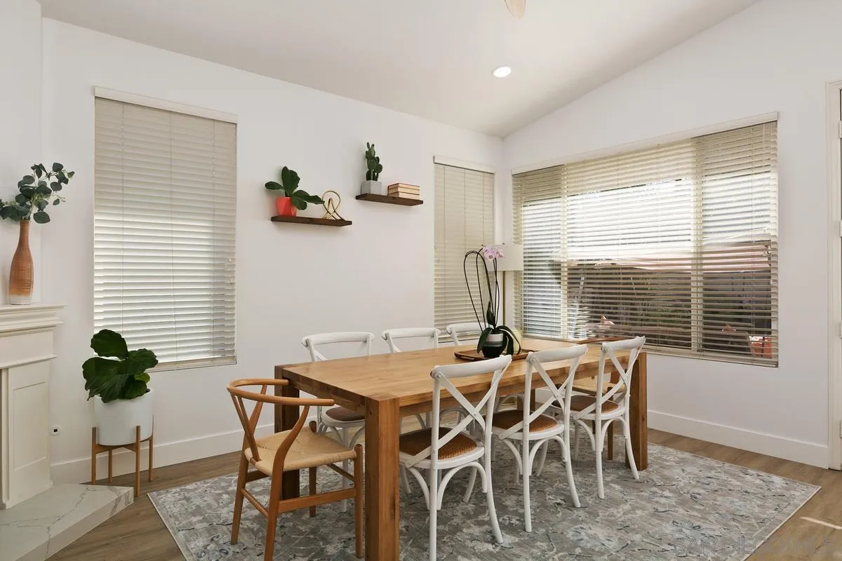 1461 Knoll Park Glen Escondido, CA 92029 - Photo 8 of 25 a view of a dining room with furniture and wooden floor