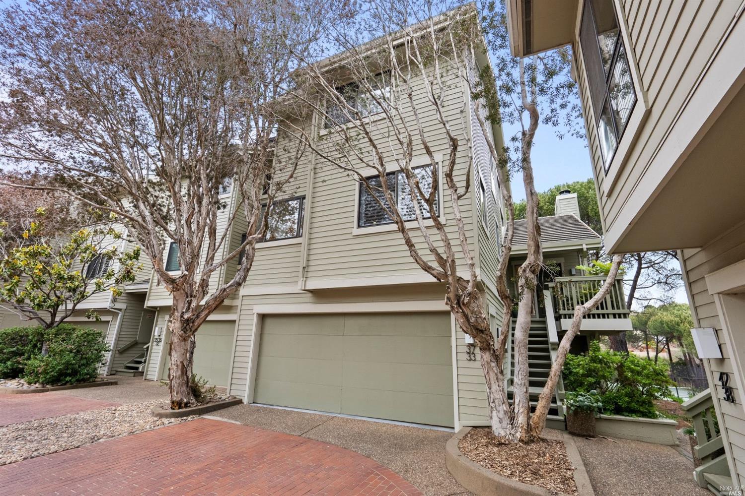 37 Eucalyptus Knoll Street Mill Valley, CA 94941 - Photo 1 of 1 a front view of a house with a tree