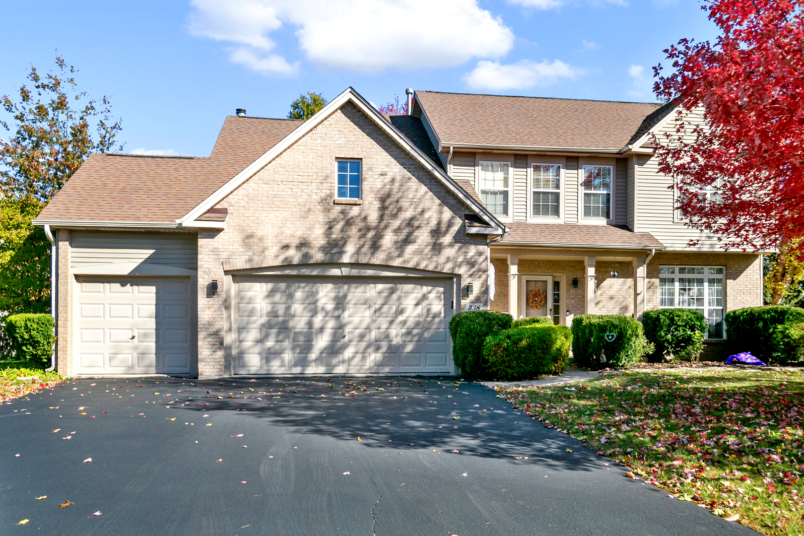 338 Millstream Lane Oswego, IL 60543 - Photo 1 of 26 a front view of a house with a garden
