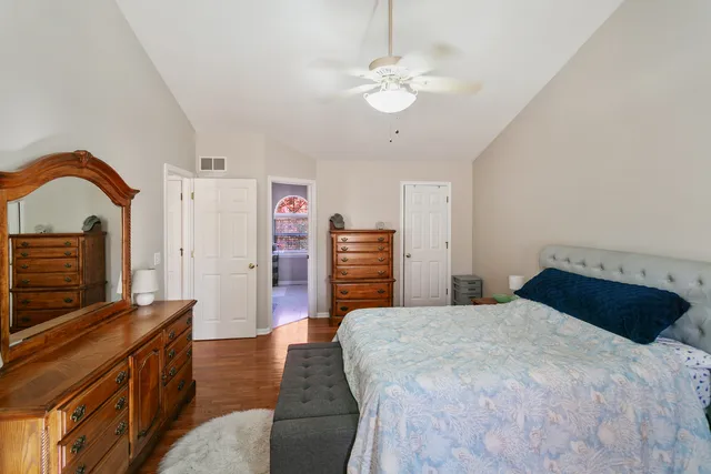a bathroom with a sink a vanity and a window