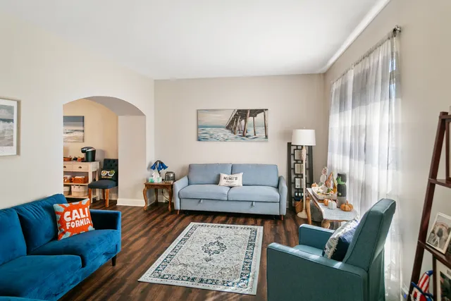 a living room with furniture and a couch