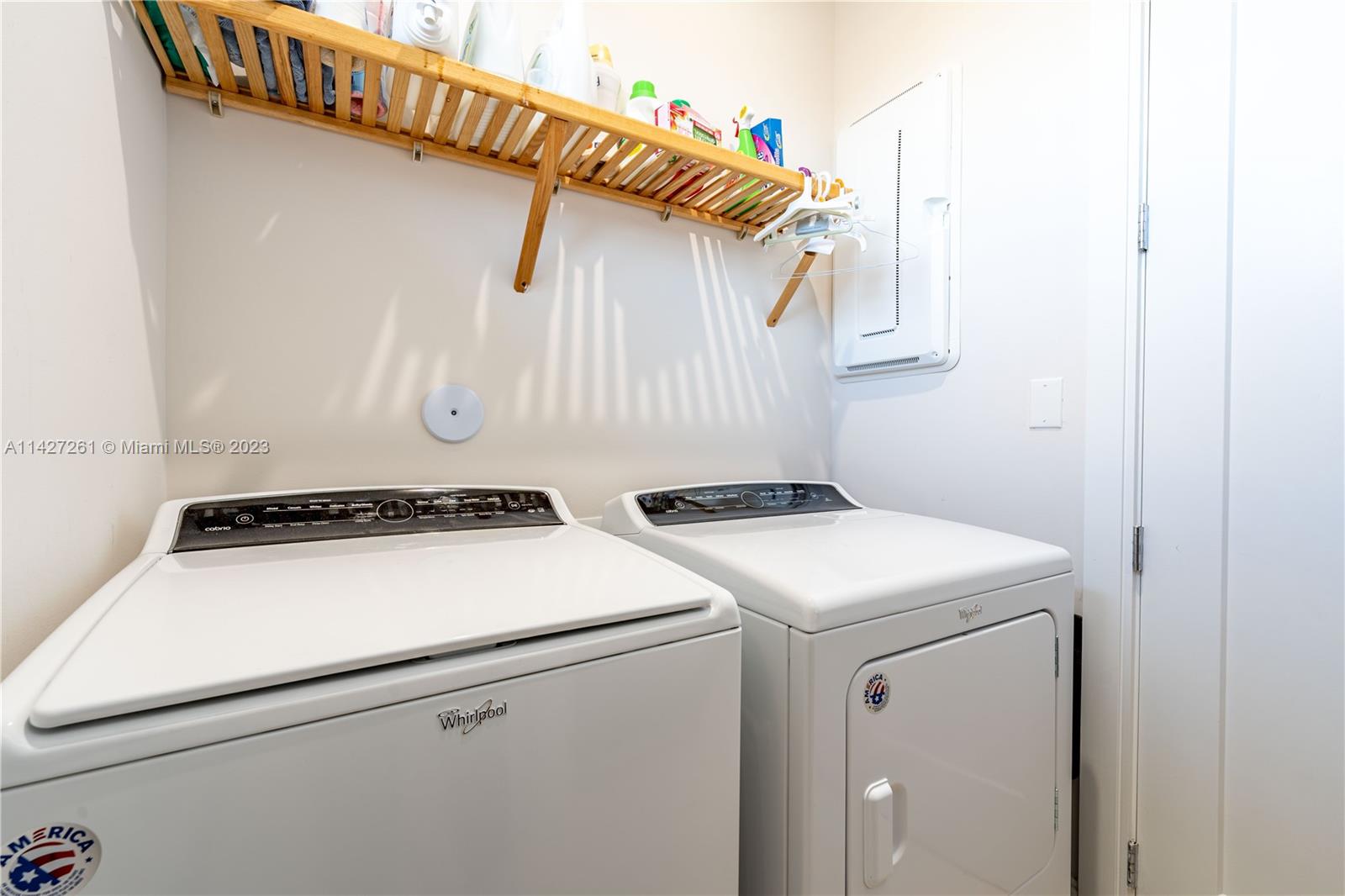 8210 Northwest 46th Street Doral, FL 33166 - Photo 28 of 59 a utility room with dryer and washer