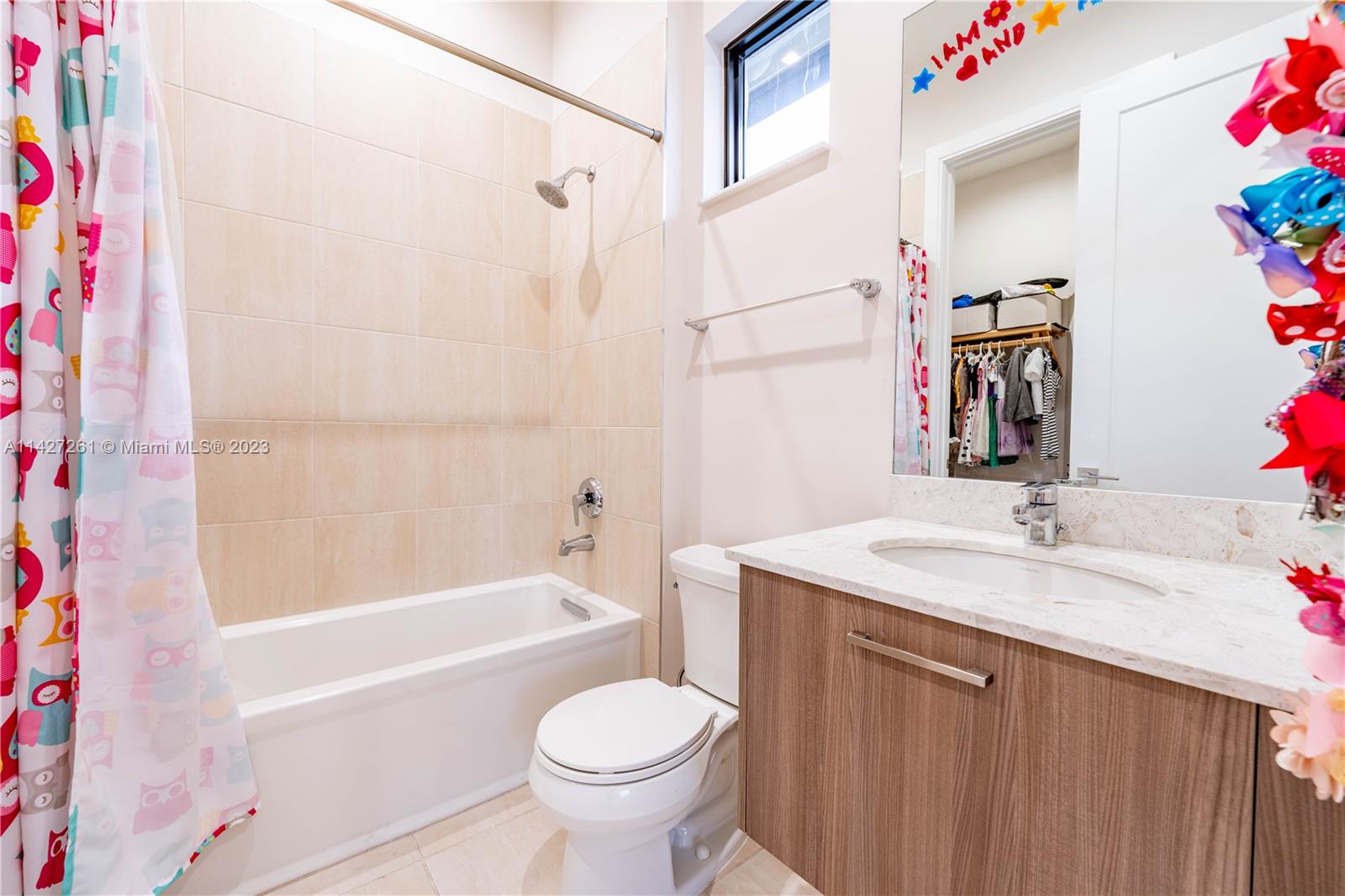 8210 Northwest 46th Street Doral, FL 33166 - Photo 36 of 59 a bathroom with a sink toilet and shower