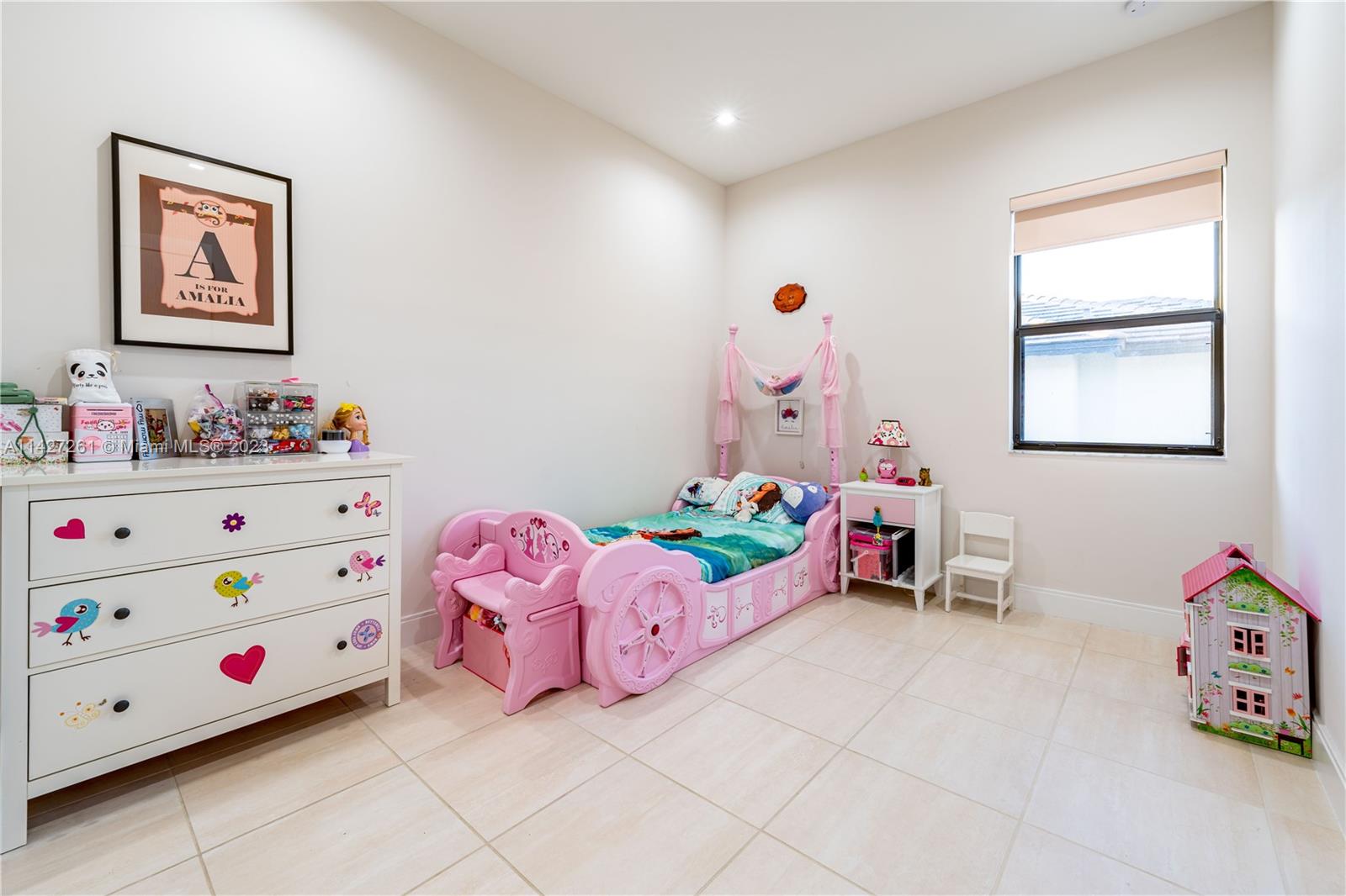 8210 Northwest 46th Street Doral, FL 33166 - Photo 42 of 59 a bedroom with furniture and a wooden floor