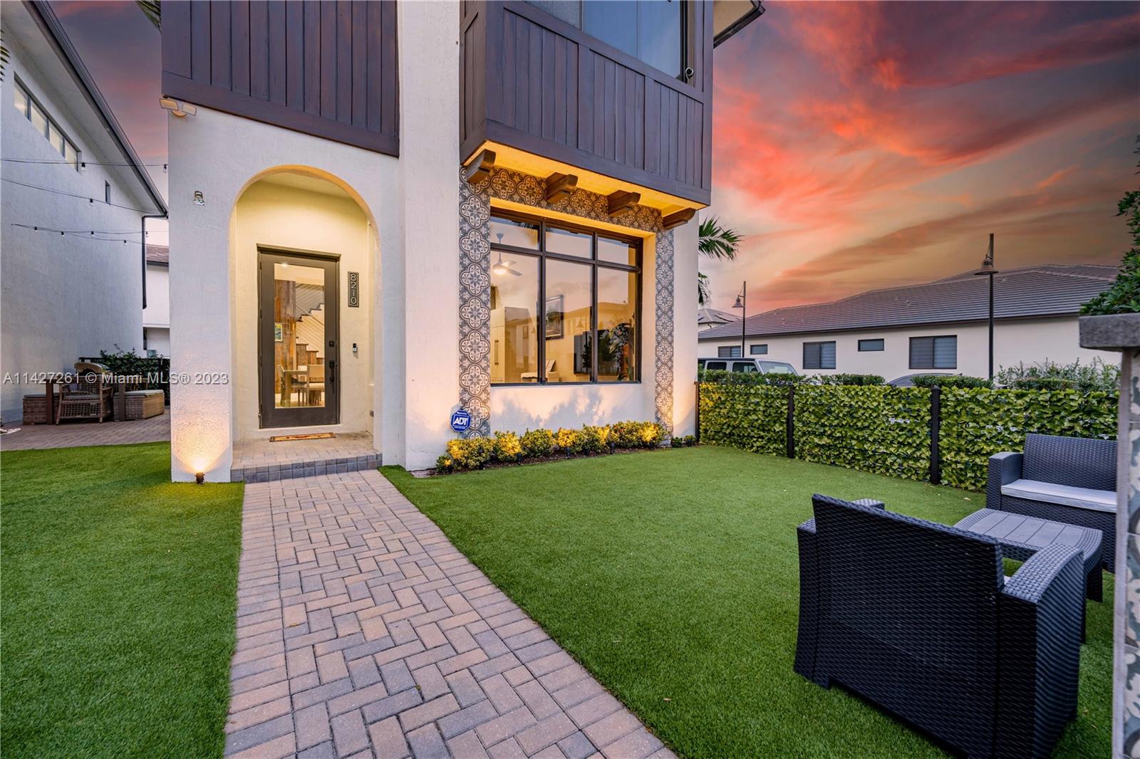8210 Northwest 46th Street Doral, FL 33166 - Photo 55 of 59 a view of a house with a tub and a yard