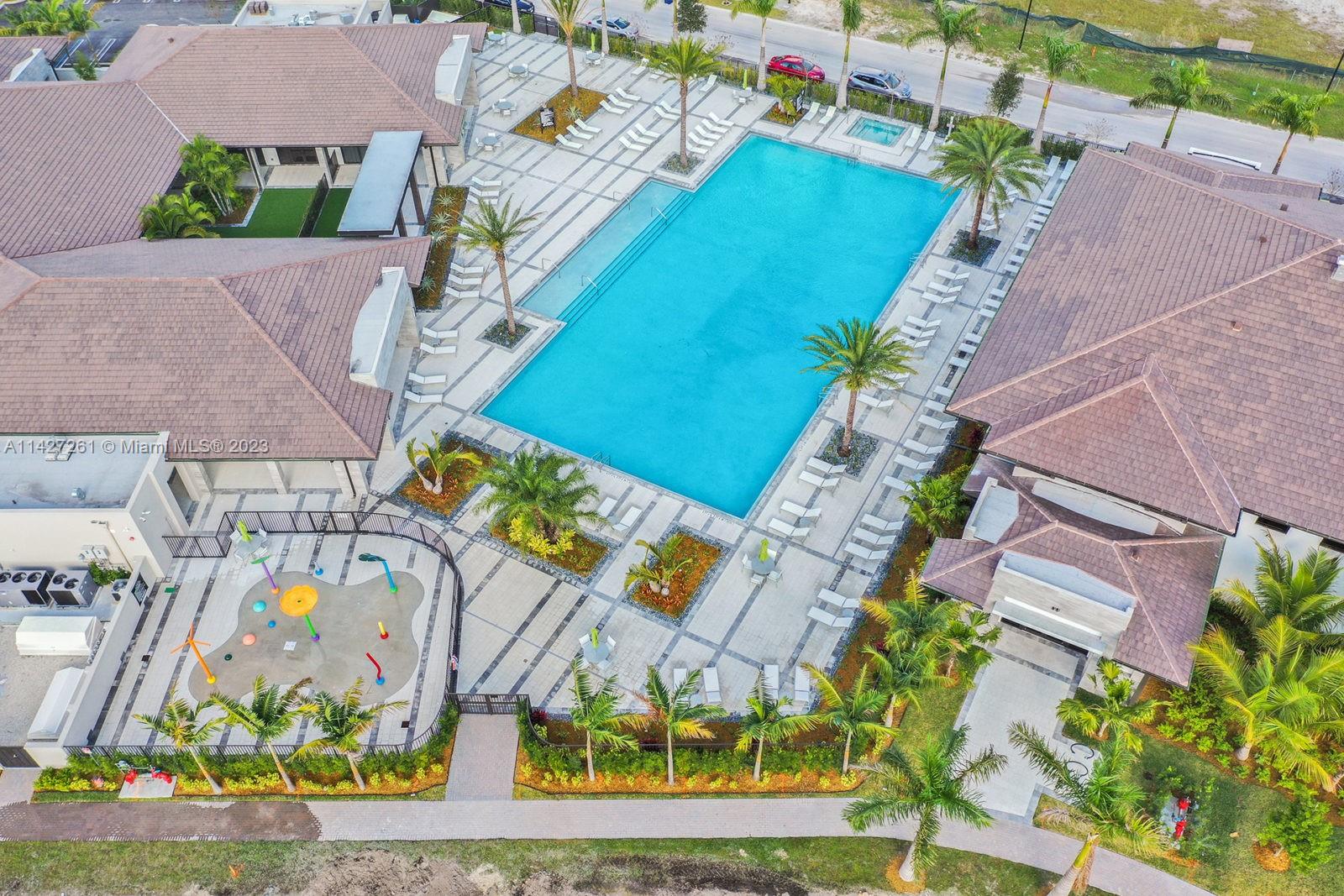 8210 Northwest 46th Street Doral, FL 33166 - Photo 59 of 59 an aerial view of a house with a yard and potted plants