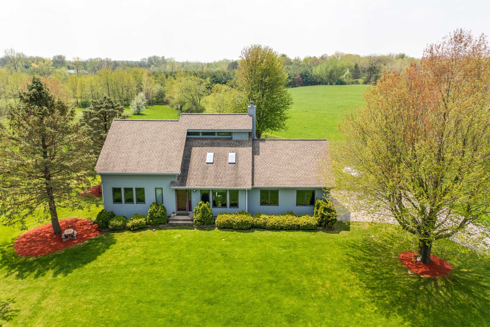 a view of house with garden space and outdoor space