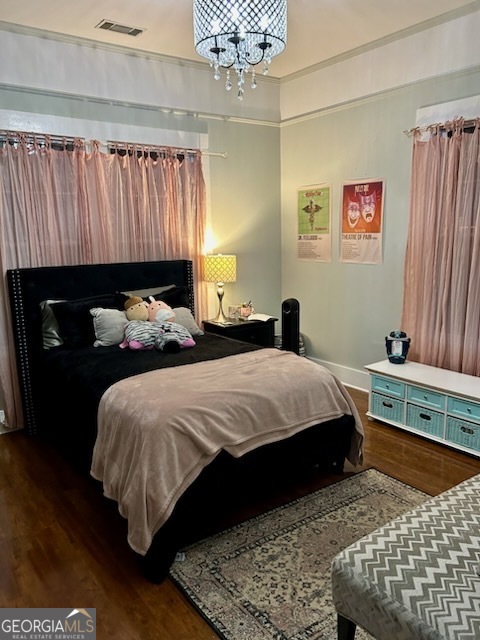 3 South Spring Street Claxton, GA 30417 - Photo 12 of 17 a bedroom with a bed and a window