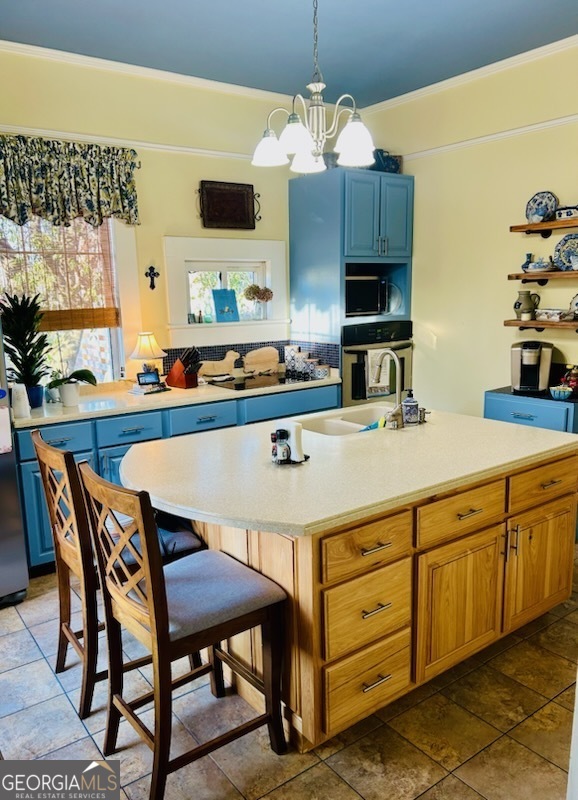 3 South Spring Street Claxton, GA 30417 - Photo 4 of 17 a kitchen with a dining table and chairs