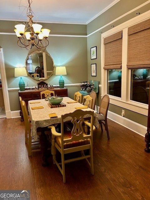 3 South Spring Street Claxton, GA 30417 - Photo 6 of 17 a view of a dining room with furniture wooden floor and chandelier