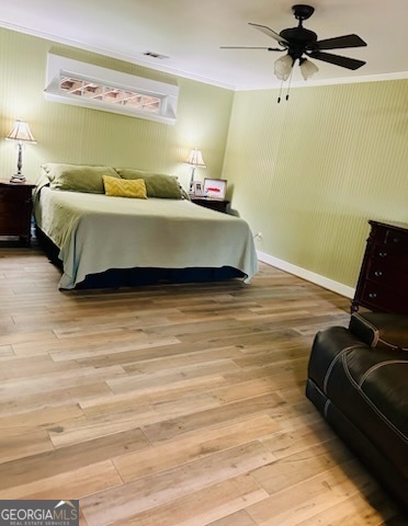 3 South Spring Street Claxton, GA 30417 - Photo 8 of 17 a bedroom with a bed and wooden floor