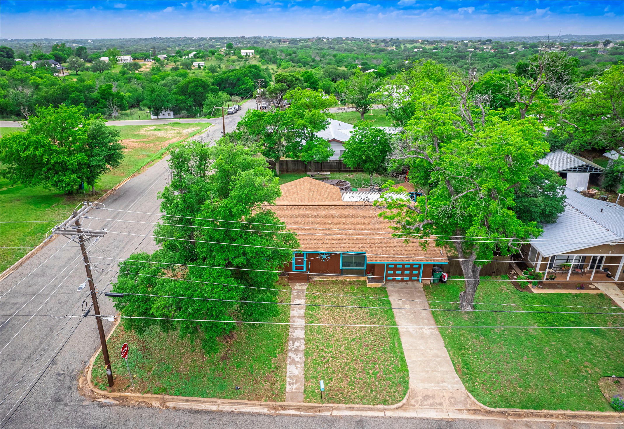 a view of a house with a yard