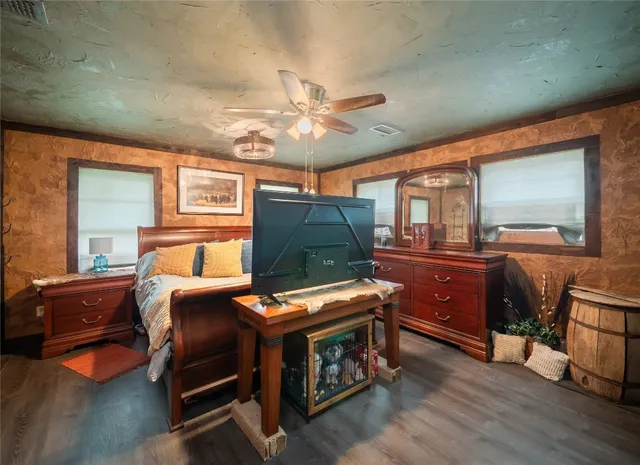 a room with furniture and a flat screen tv