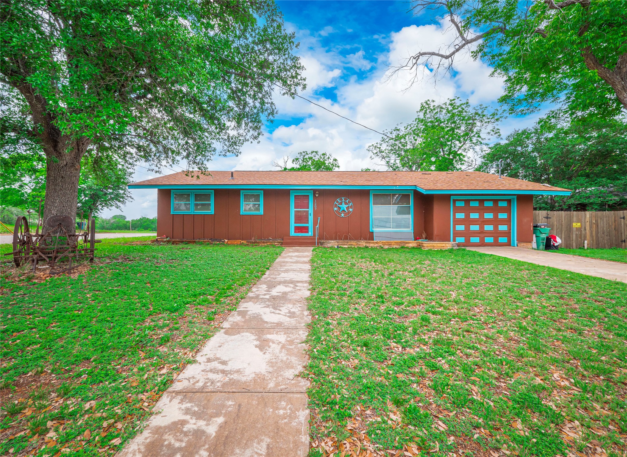 1207 Flag Street Llano, TX 78643 - Photo 2 of 40 front view of a house with a yard
