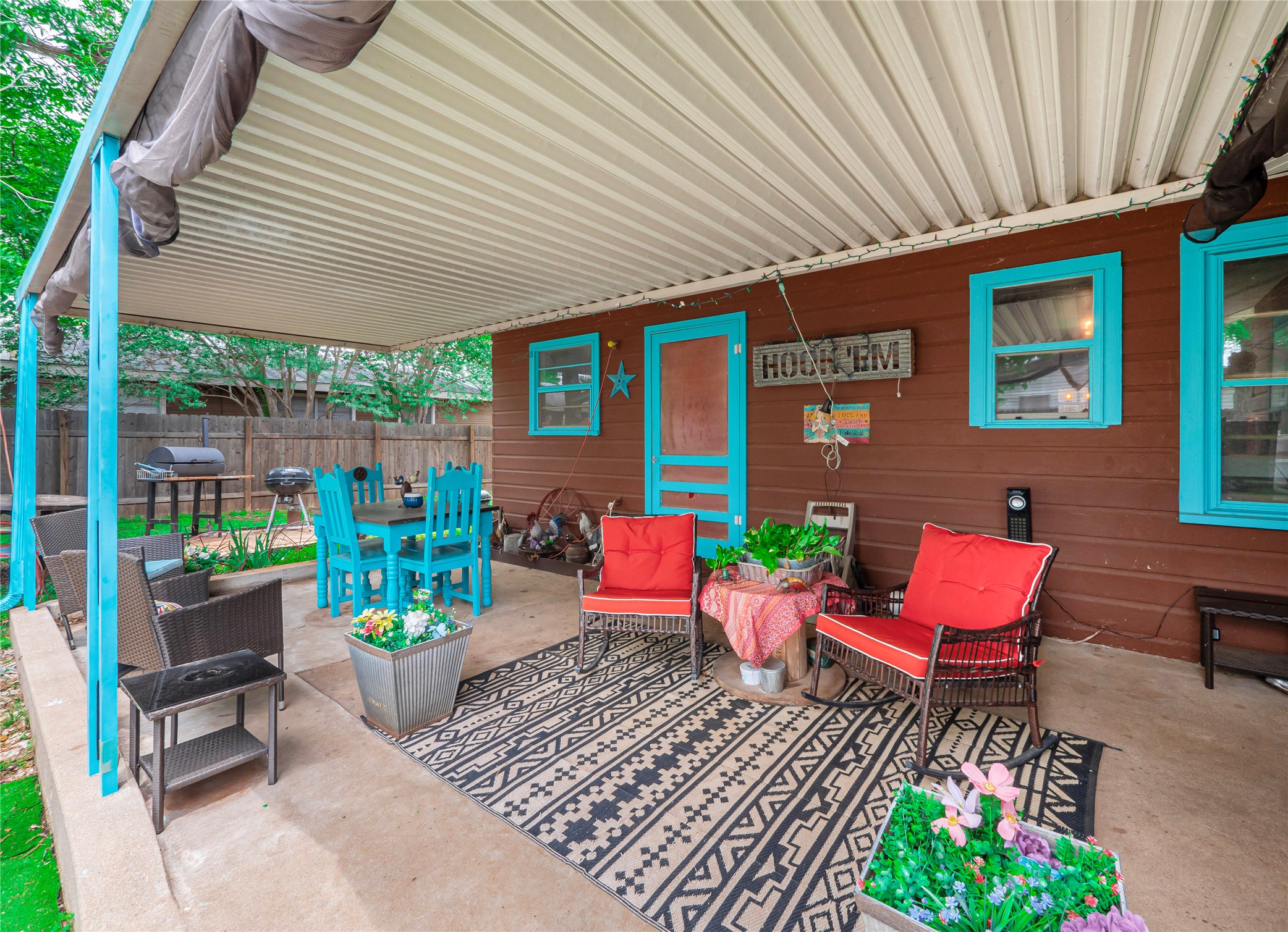 1207 Flag Street Llano, TX 78643 - Photo 29 of 40 a backyard of a house with seating space