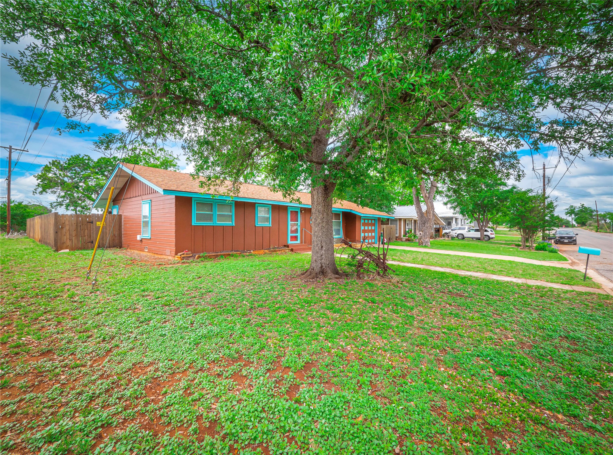 1207 Flag Street Llano, TX 78643 - Photo 3 of 40 a view of a house with a yard