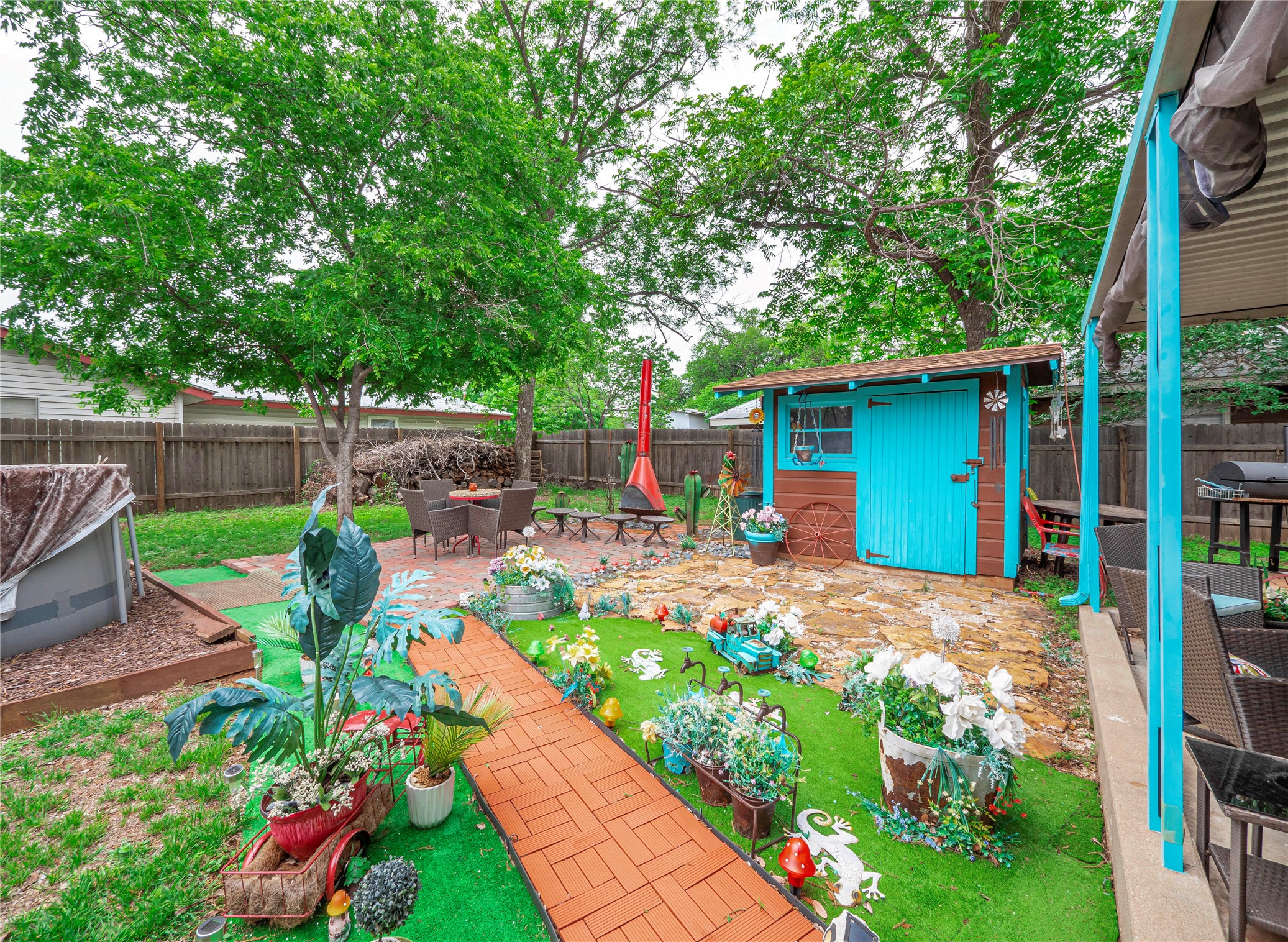 1207 Flag Street Llano, TX 78643 - Photo 32 of 40 a view of a backyard with patio