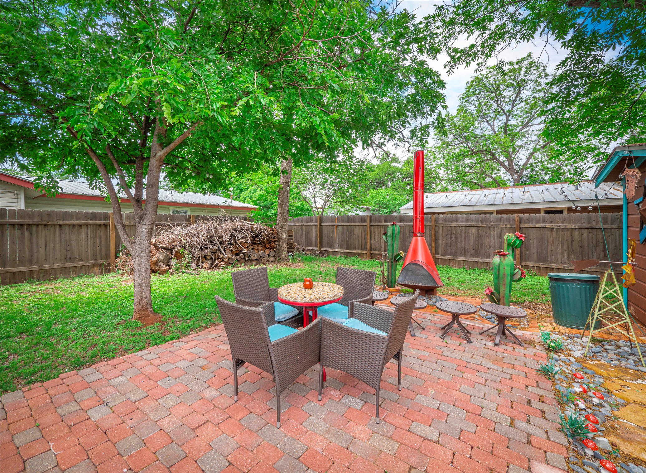 1207 Flag Street Llano, TX 78643 - Photo 33 of 40 a view of backyard with seating space and trees
