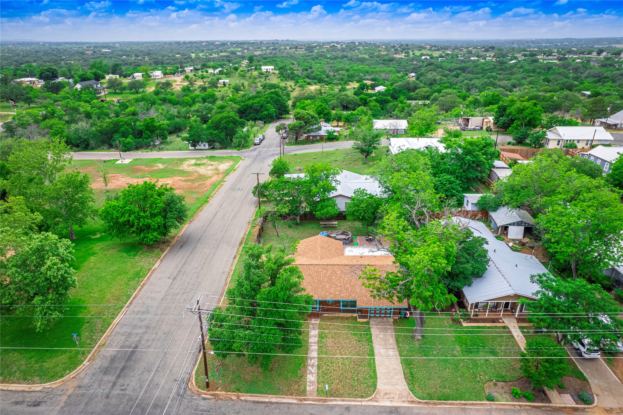 1207 Flag Street Llano, TX 78643 - Photo 37 of 40 a view of a lake with a yard