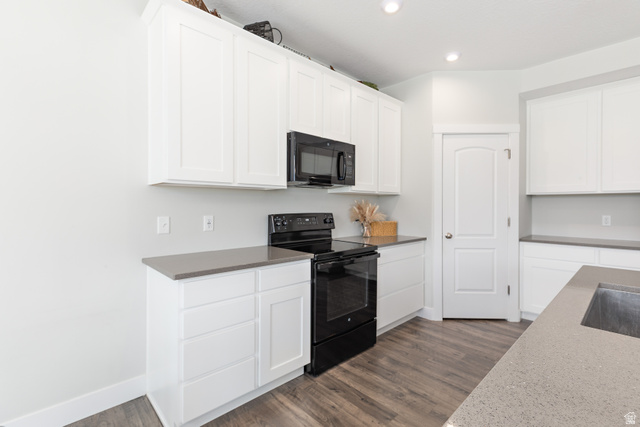 2343 Wysteria Drive Mapleton, UT 84664 - Photo 11 of 30 Kitchen with black appliances, white cabinets, dark wood-type flooring, and recessed lighting