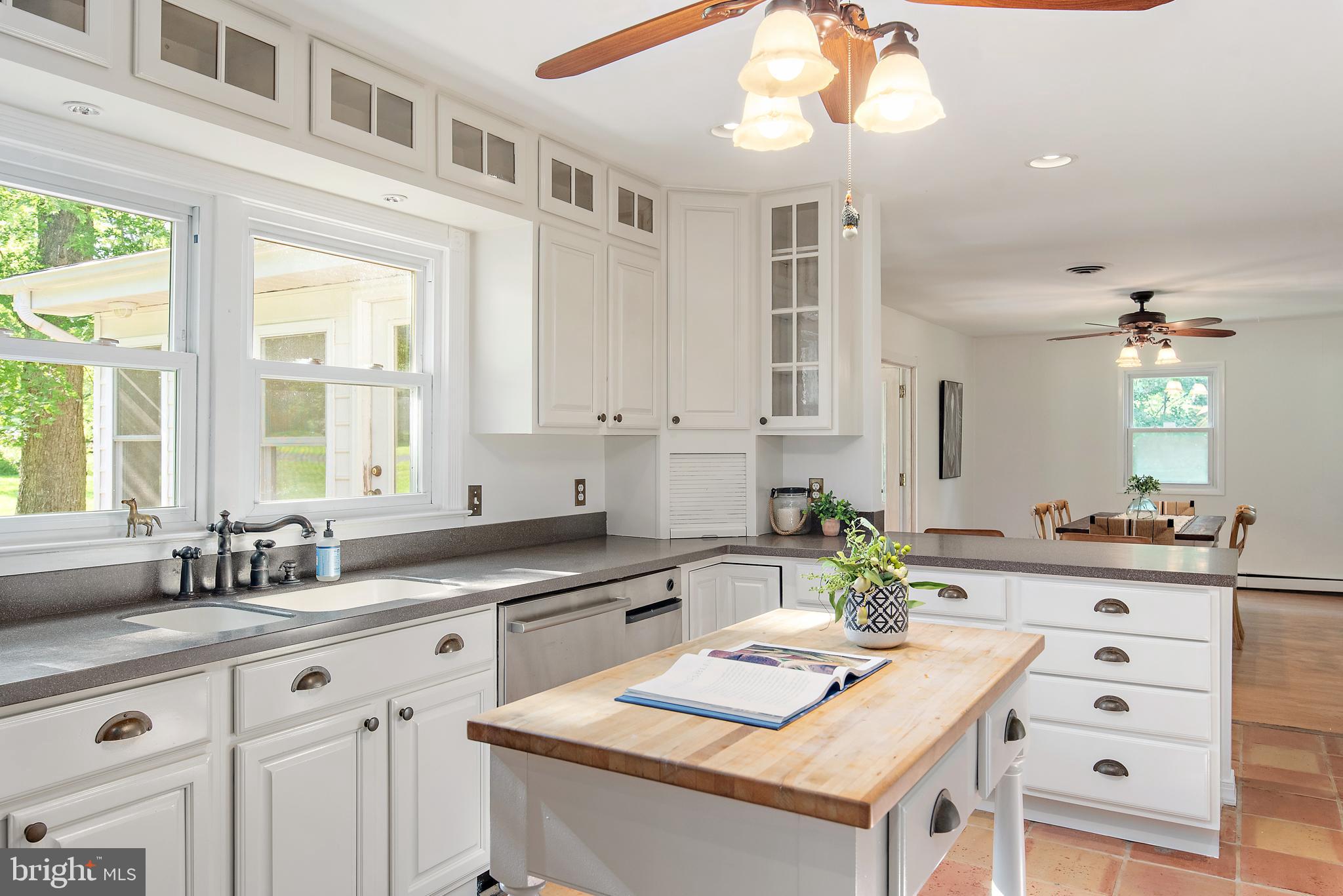 3514 Williamsburg Road Davidsonville, MD 21035 - Photo 2 of 50 a kitchen with granite countertop a sink cabinets and window