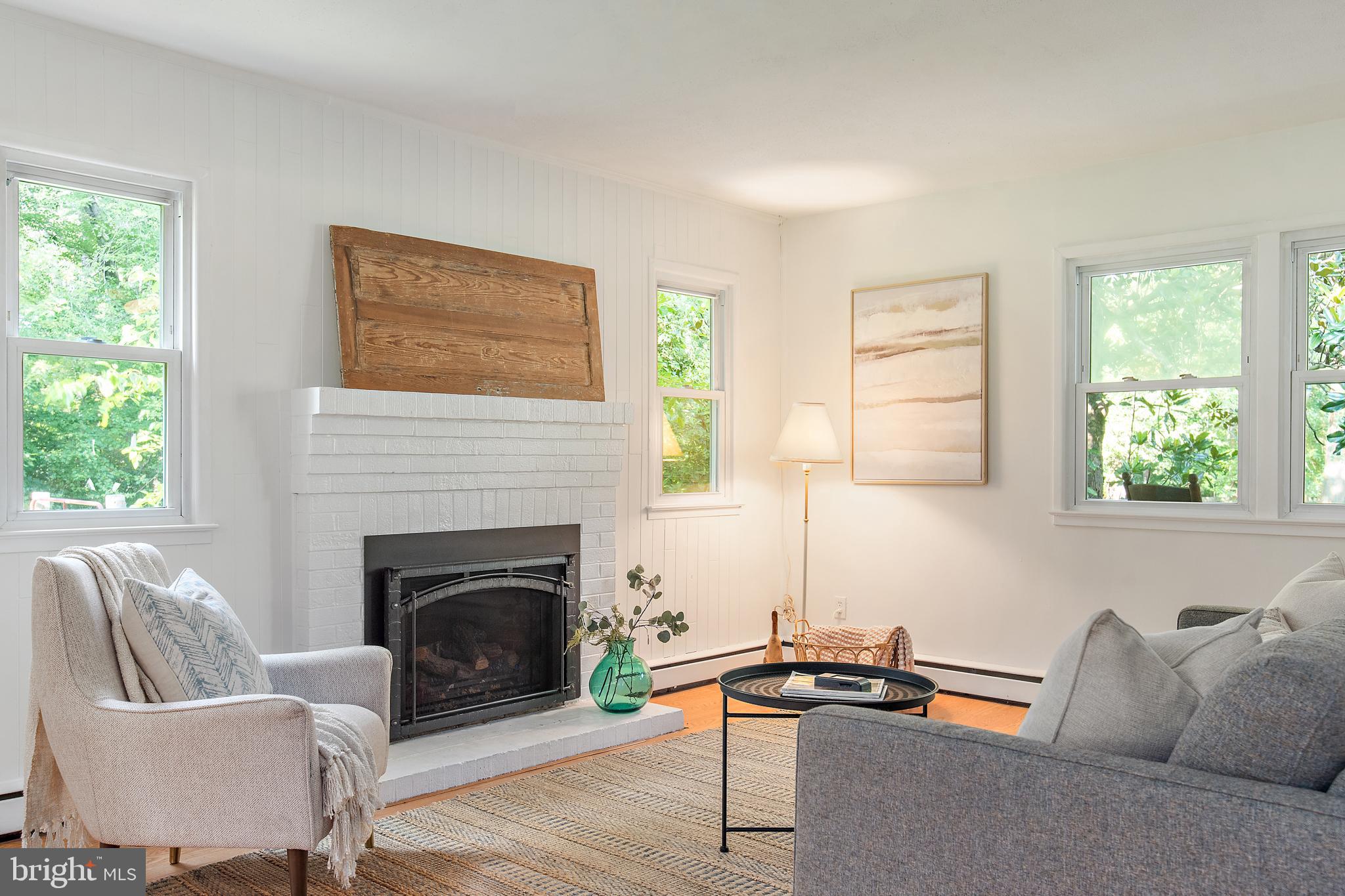 3514 Williamsburg Road Davidsonville, MD 21035 - Photo 21 of 50 a living room with furniture a window and a fireplace