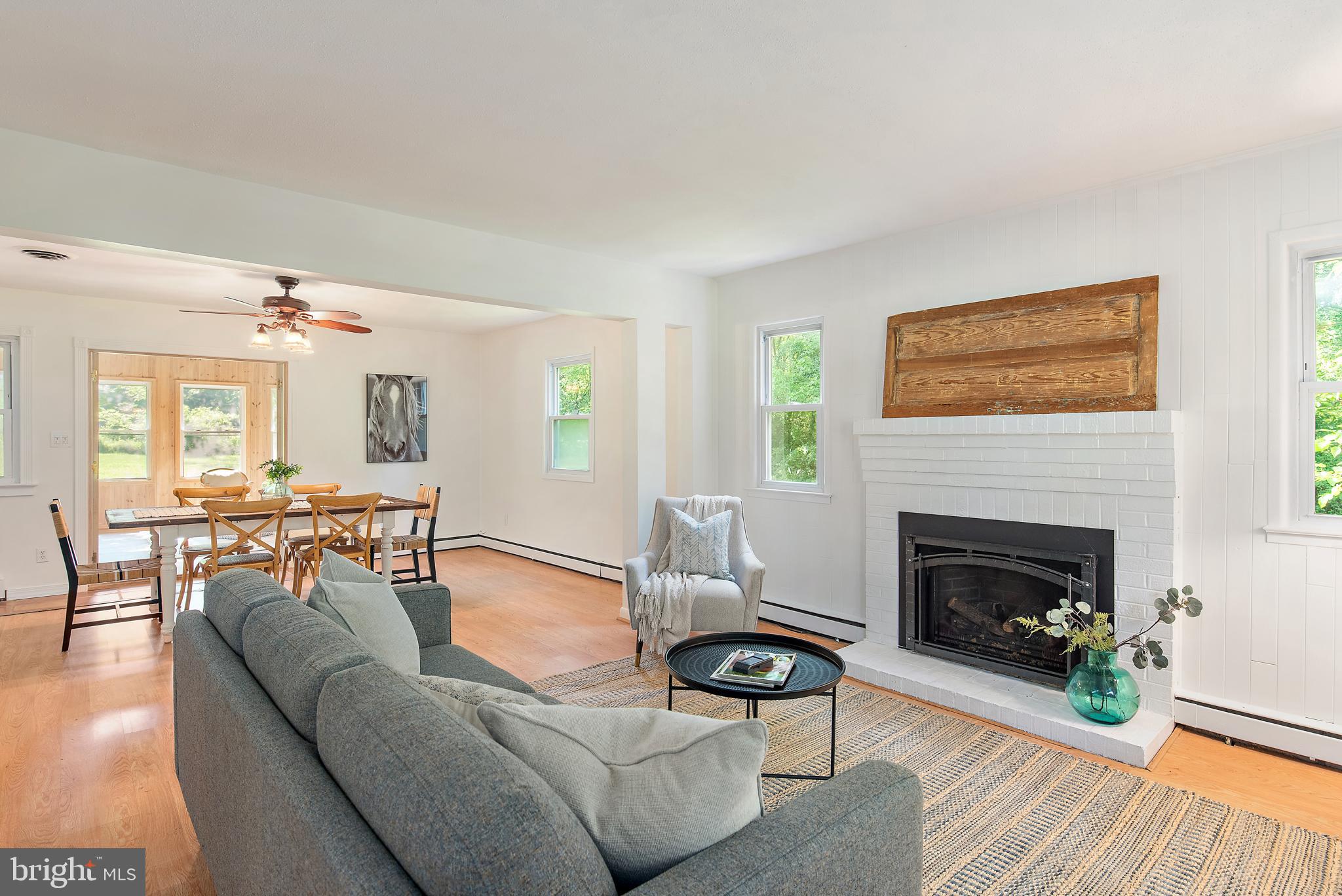 3514 Williamsburg Road Davidsonville, MD 21035 - Photo 22 of 50 a living room with furniture and a fireplace