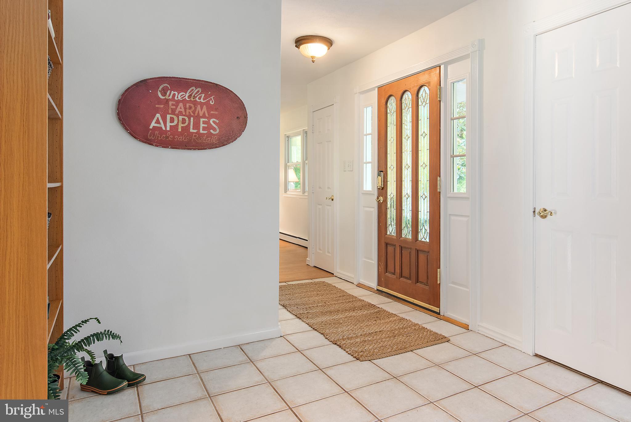 3514 Williamsburg Road Davidsonville, MD 21035 - Photo 24 of 50 a view of an entryway with a bench