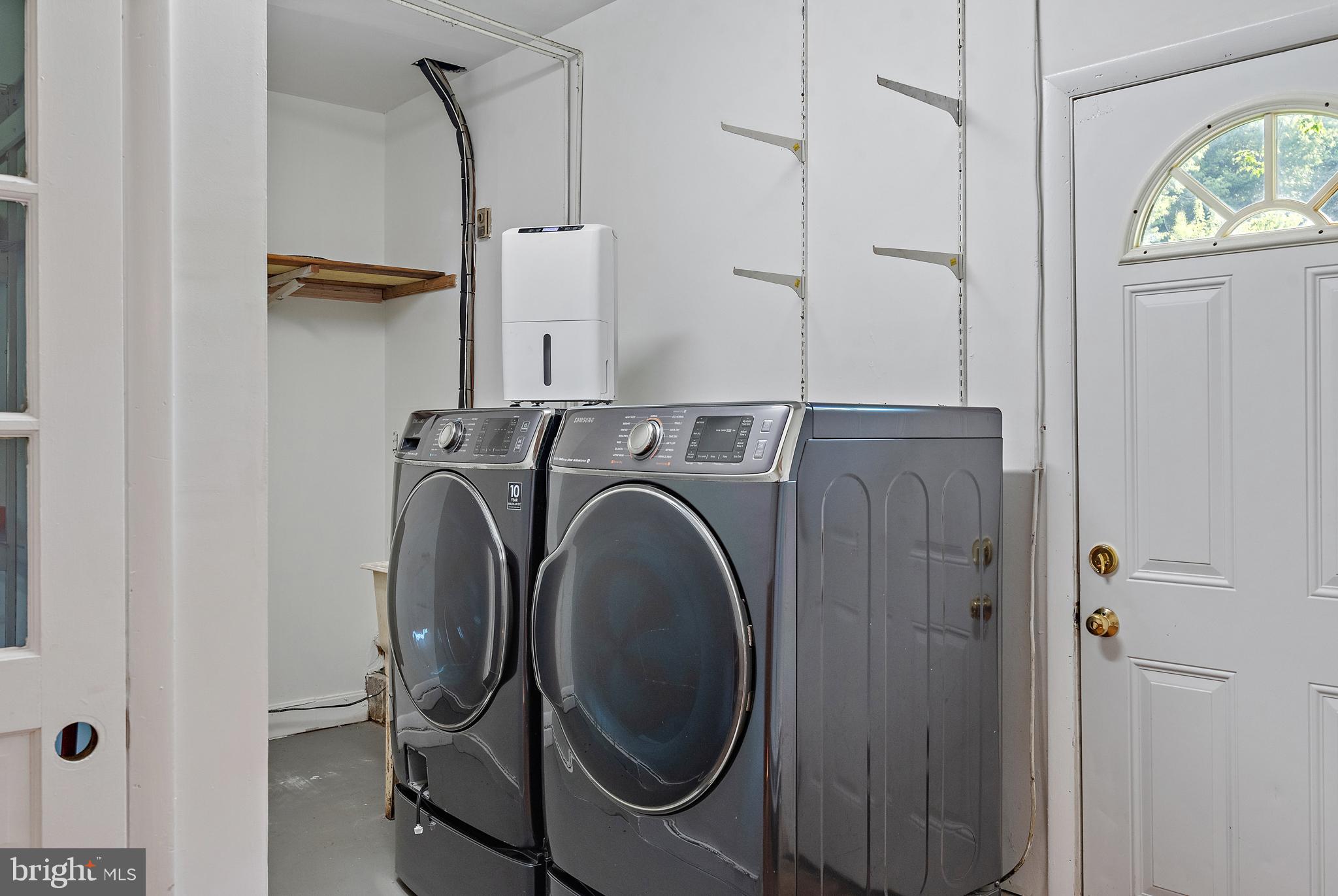 3514 Williamsburg Road Davidsonville, MD 21035 - Photo 25 of 50 a utility room with dryer and washer
