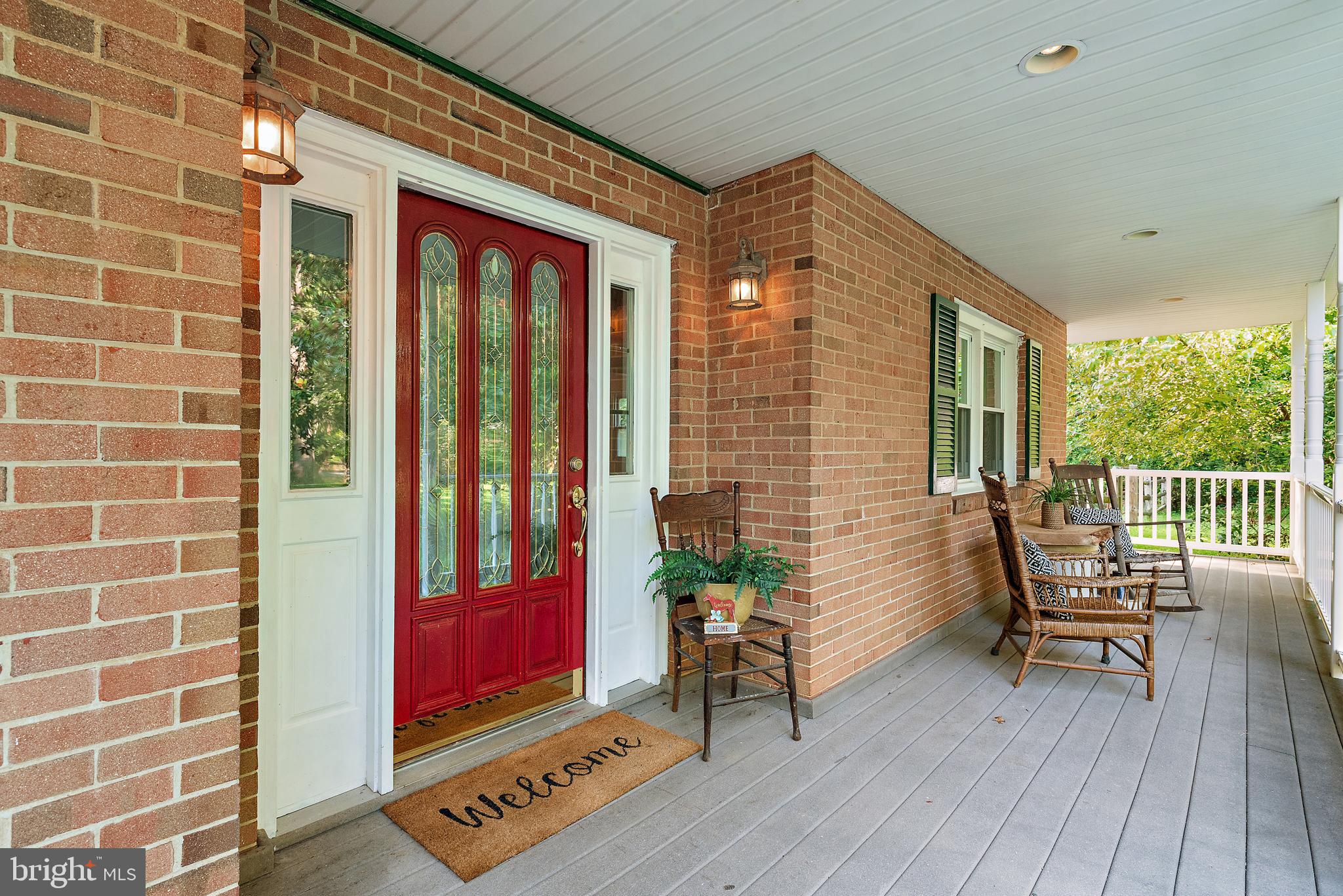 3514 Williamsburg Road Davidsonville, MD 21035 - Photo 33 of 50 a view of a balcony with chairs and wooden floor