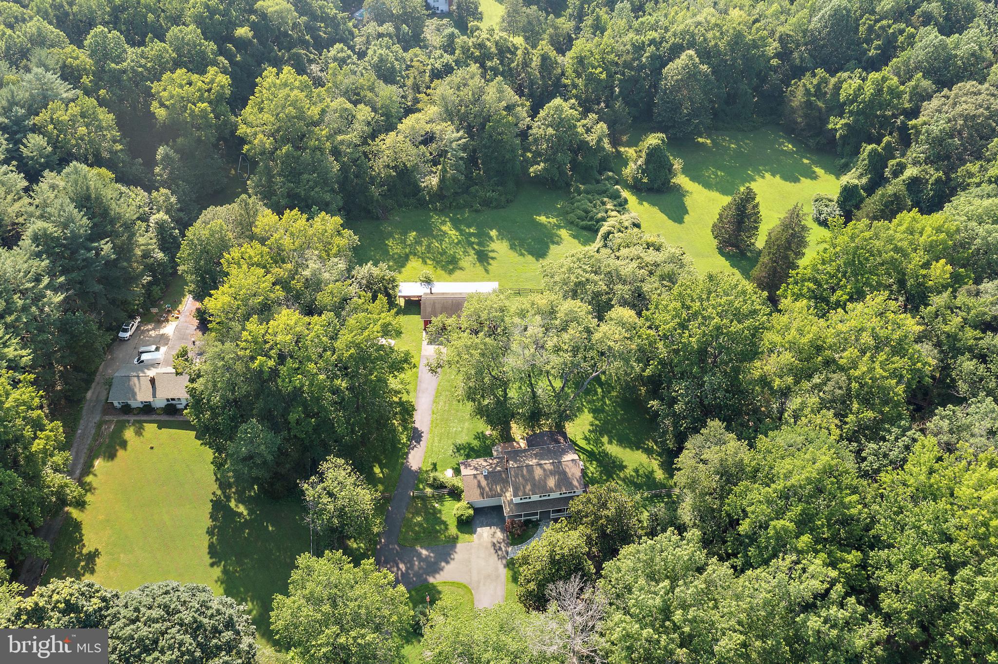 3514 Williamsburg Road Davidsonville, MD 21035 - Photo 35 of 50 a backyard of a house with a yard with outdoor seating