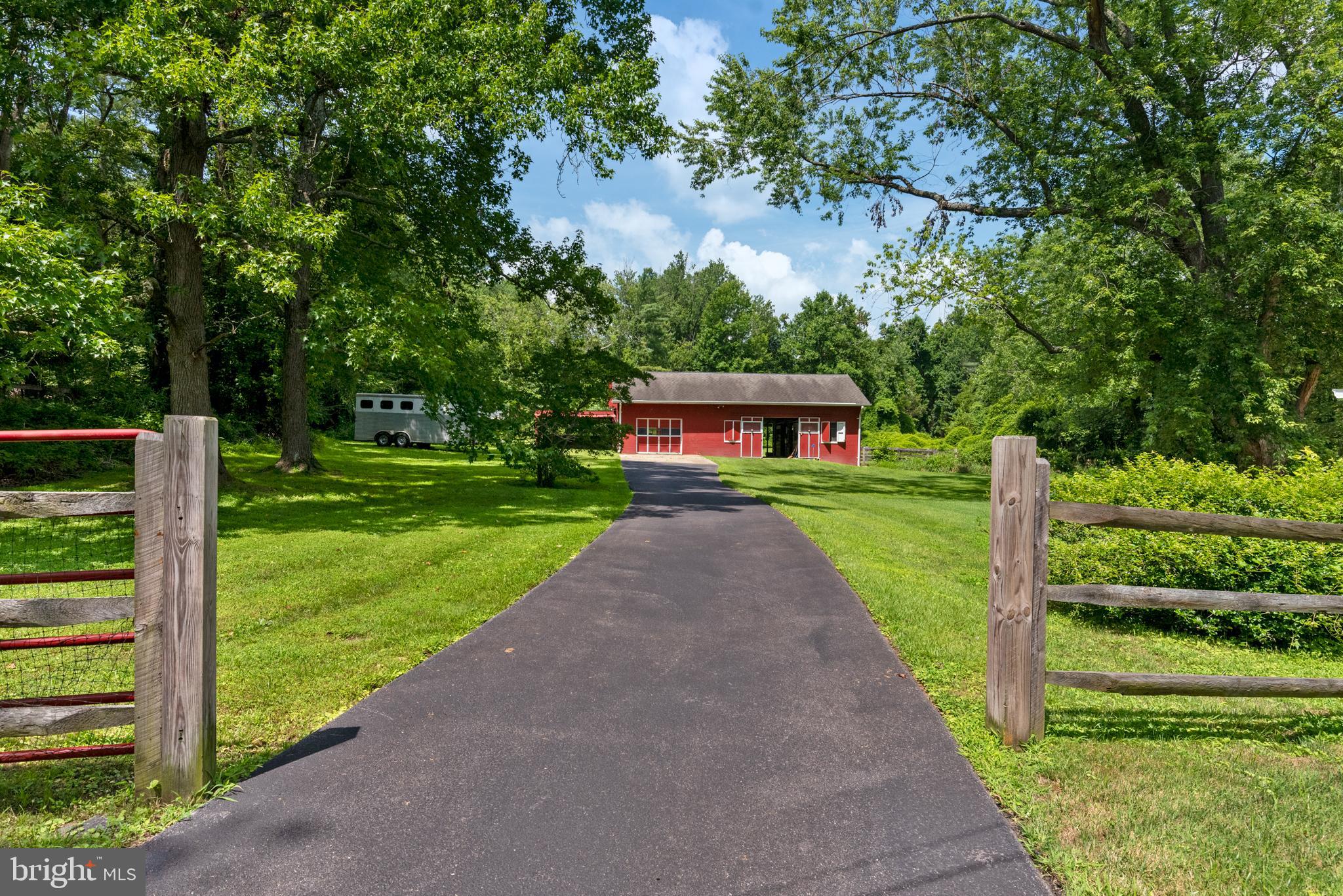 3514 Williamsburg Road Davidsonville, MD 21035 - Photo 38 of 50 a front view of a house with a yard table and chairs