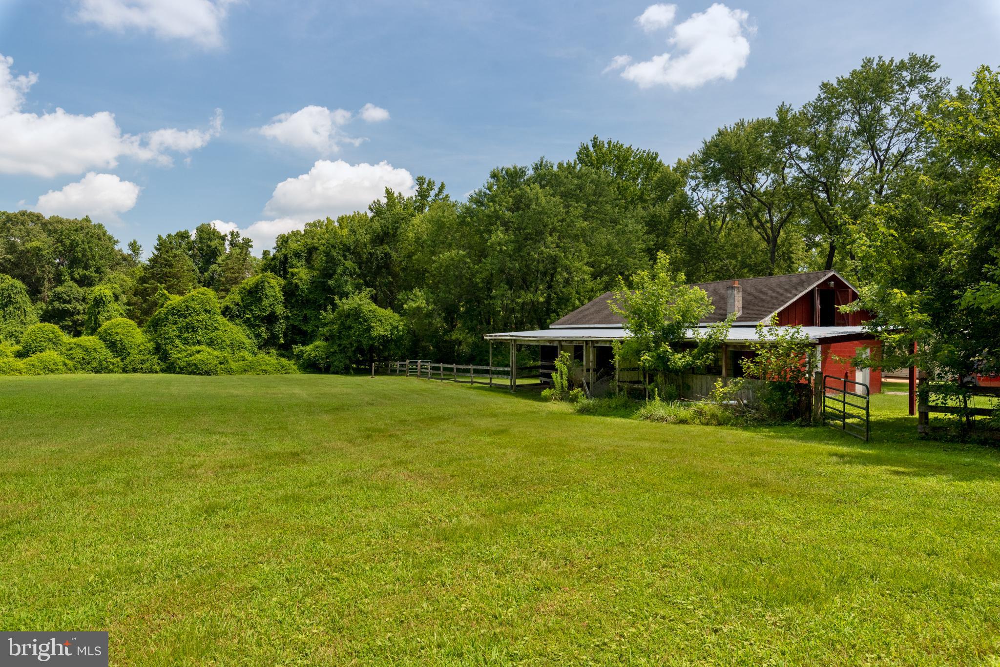 3514 Williamsburg Road Davidsonville, MD 21035 - Photo 43 of 50 a front view of a house with garden