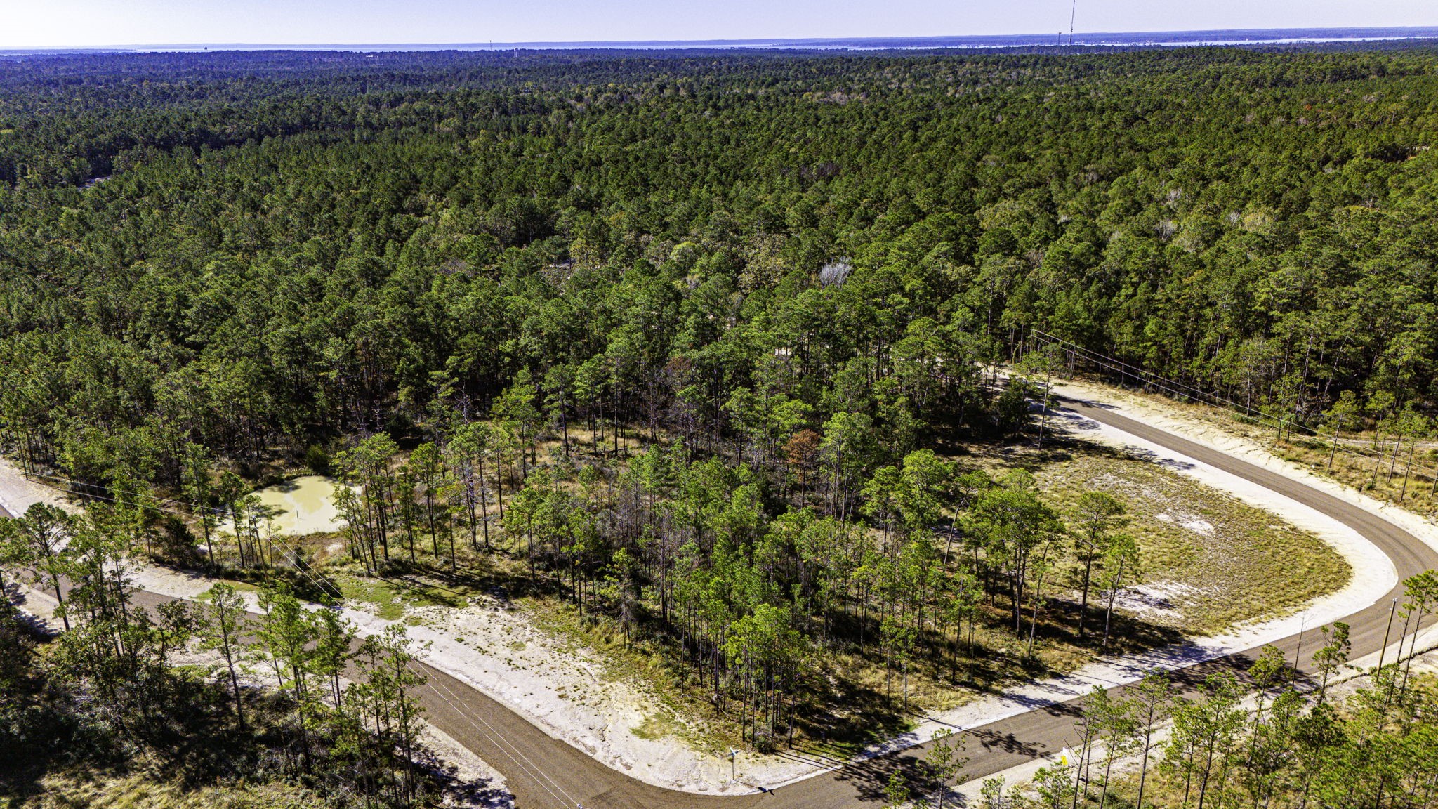 18 Magnolia Ranch Road Onalaska, TX 77360 - Photo 3 of 11 a view of a yard with an outdoor space