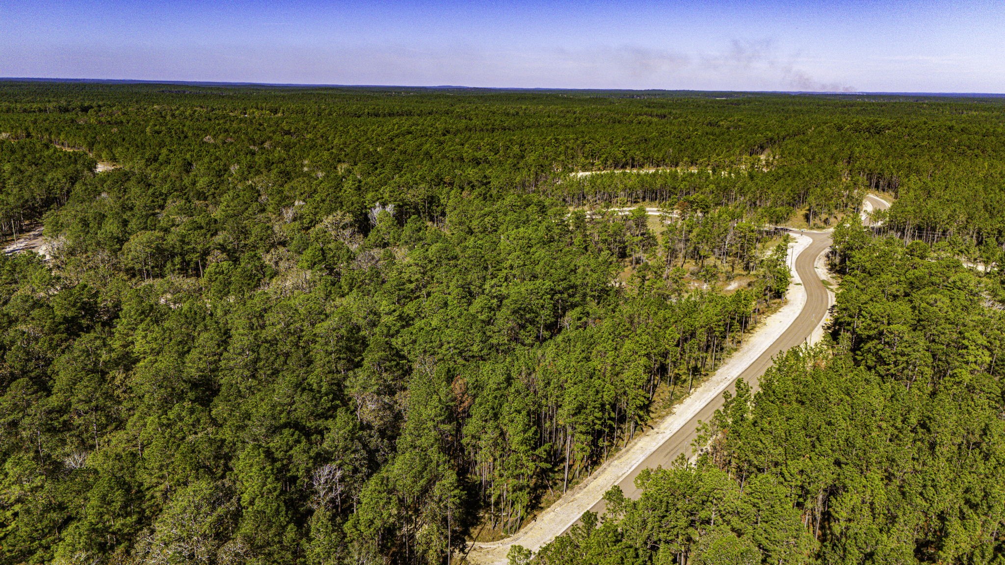 18 Magnolia Ranch Road Onalaska, TX 77360 - Photo 7 of 11 a view of an outdoor space and a mountain view