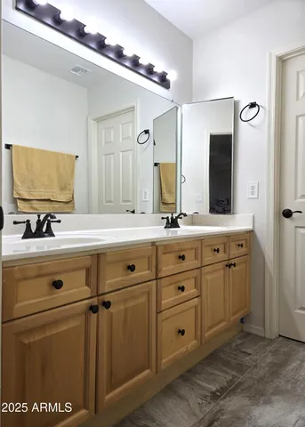 a white toilet sitting next to a shower curtain