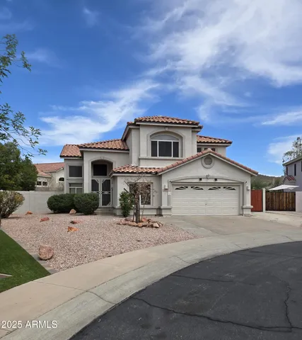 front view of a house with a patio