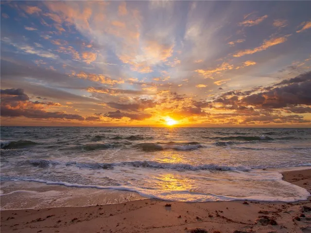 a view of beach and ocean
