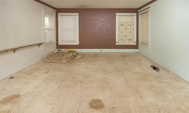 an empty room with windows
