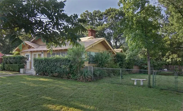a backyard of a house with lots of green space