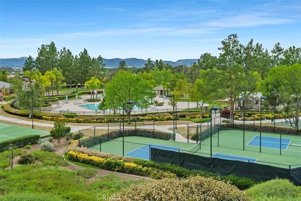 a view of a lake with a yard