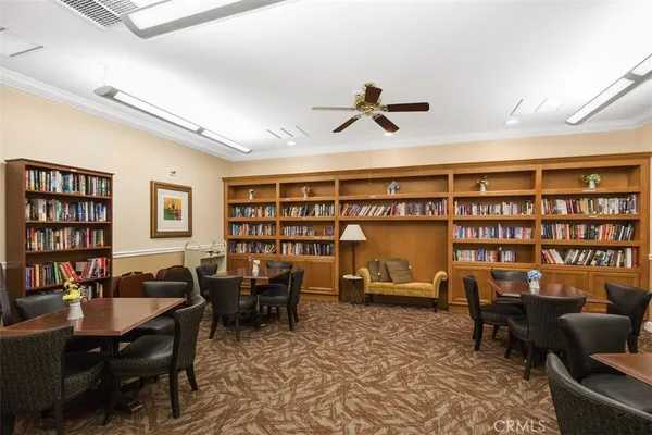 a lobby with furniture and wooden floor